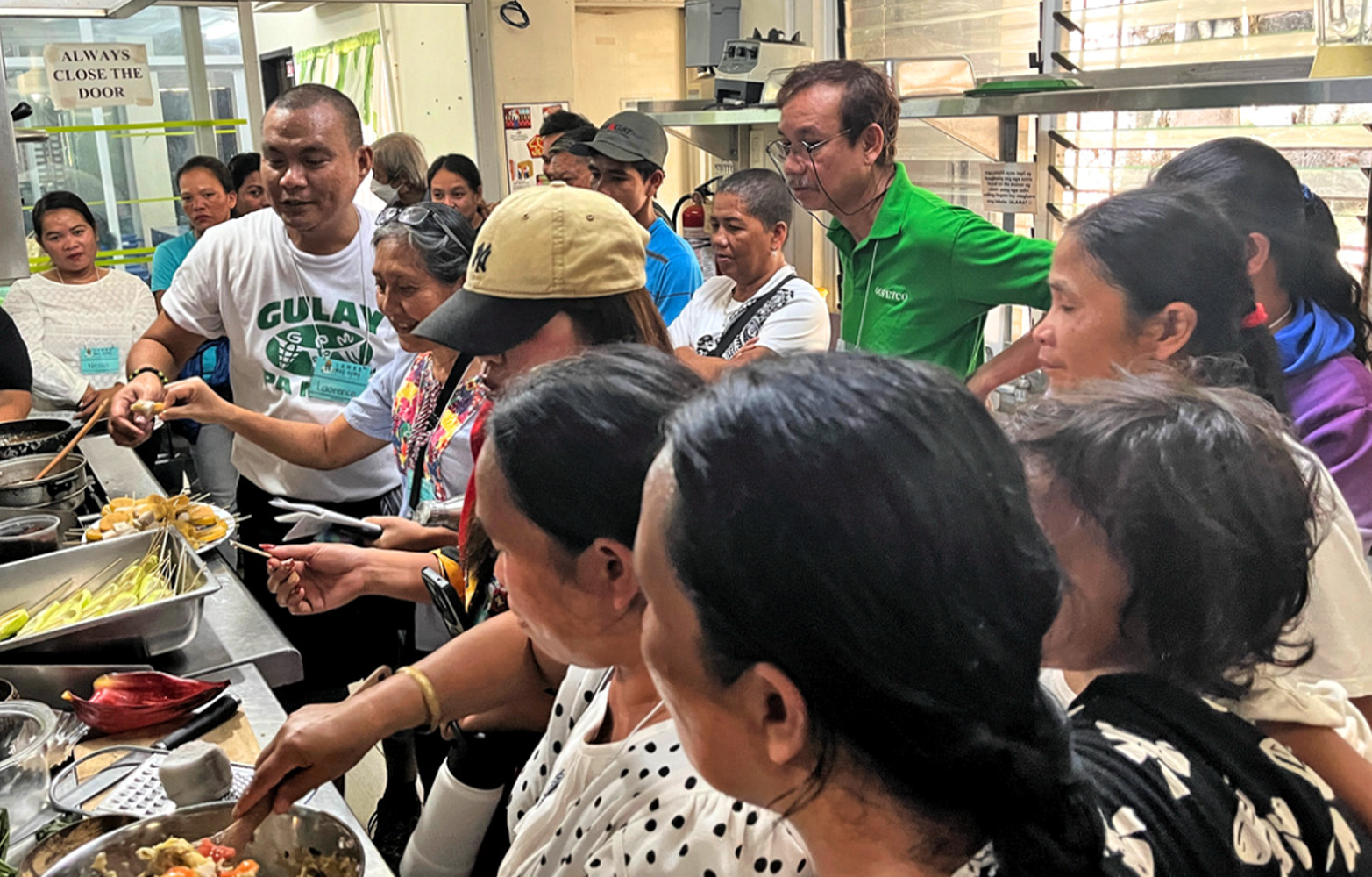 Participants taking part in the cooking demonstration